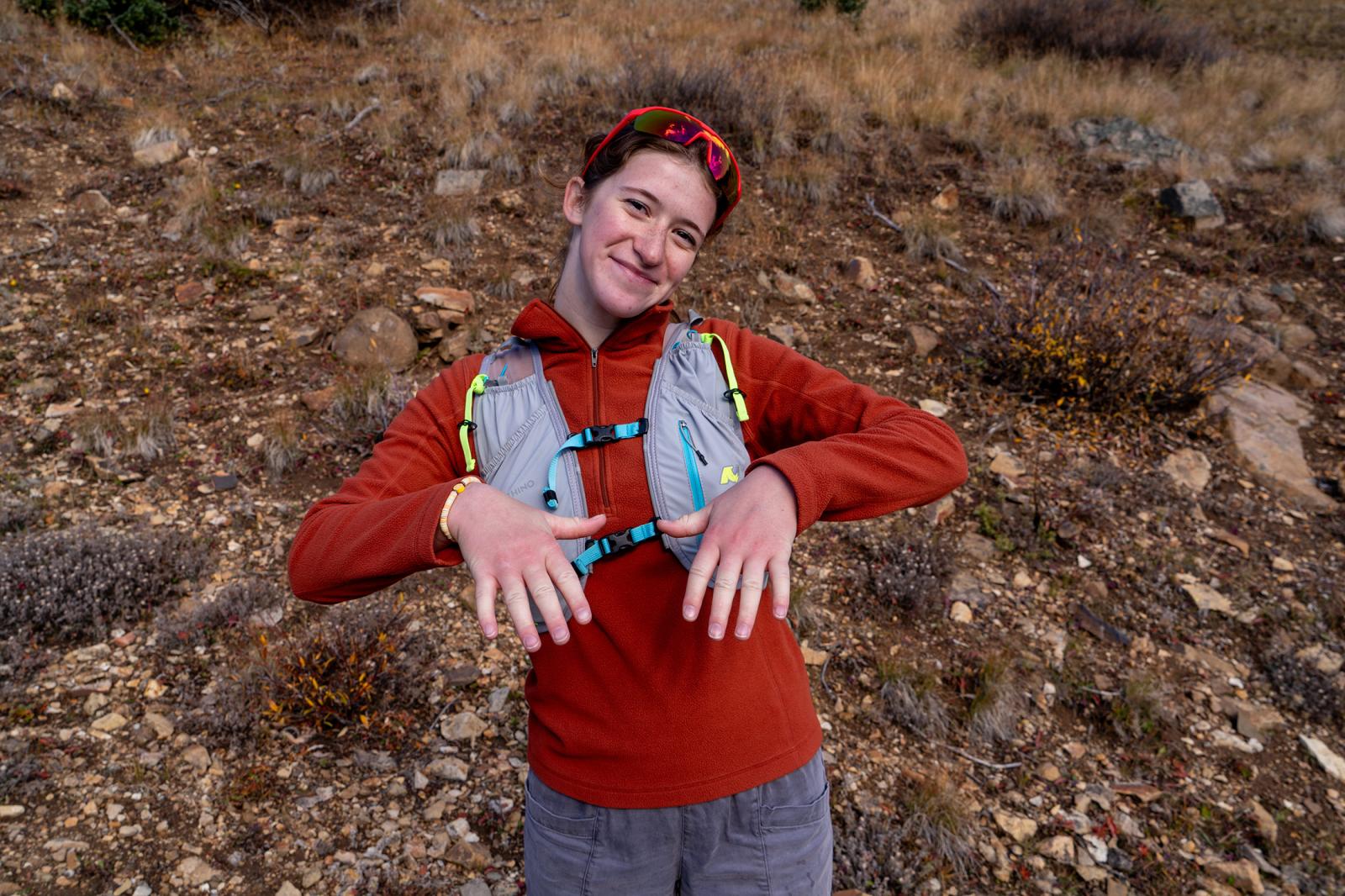 Mya's hands at high elevation.