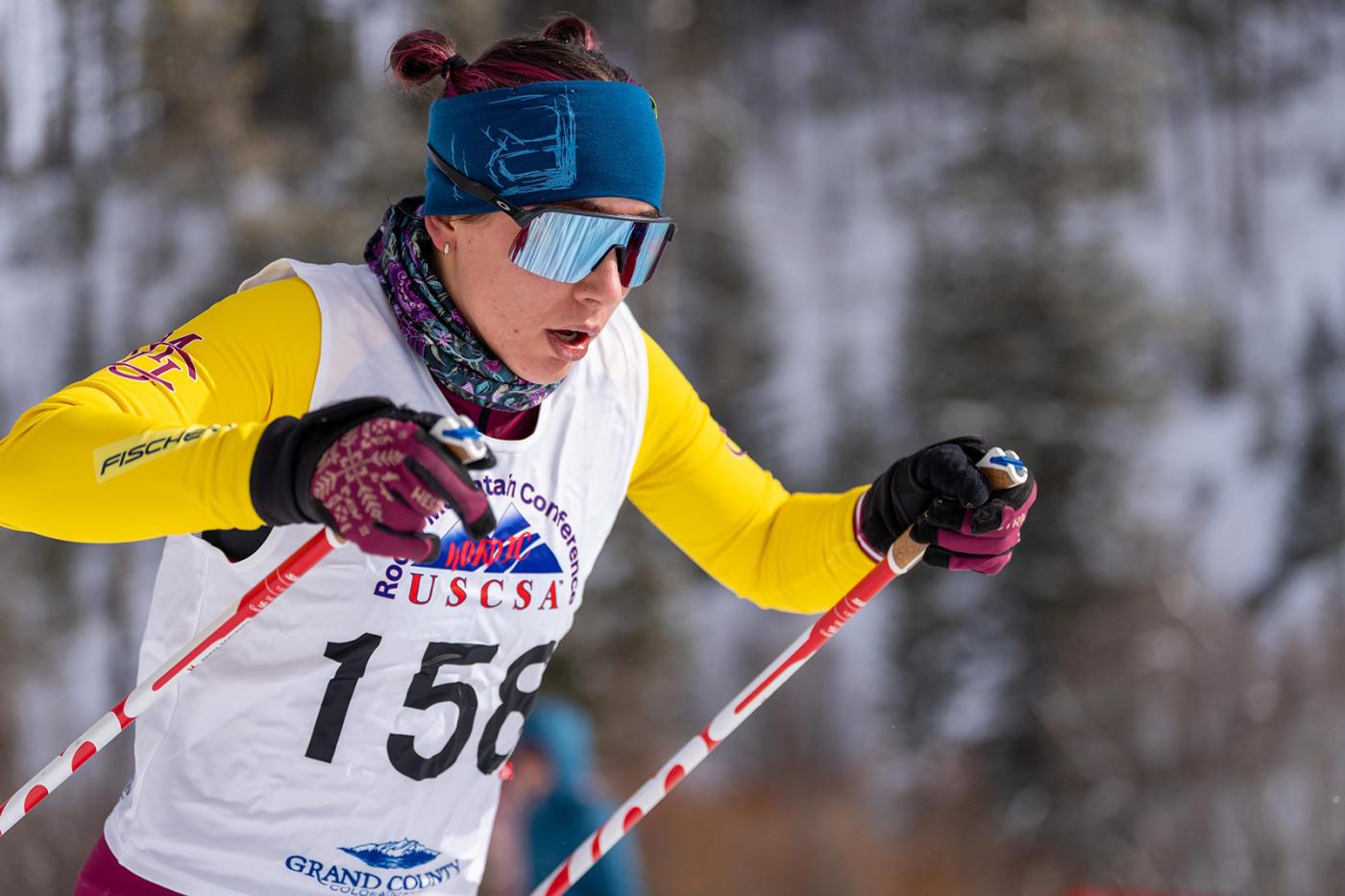 Greta Bochenek (CMU) breaks the race open early, skiing solo to a dominant first-place finish.