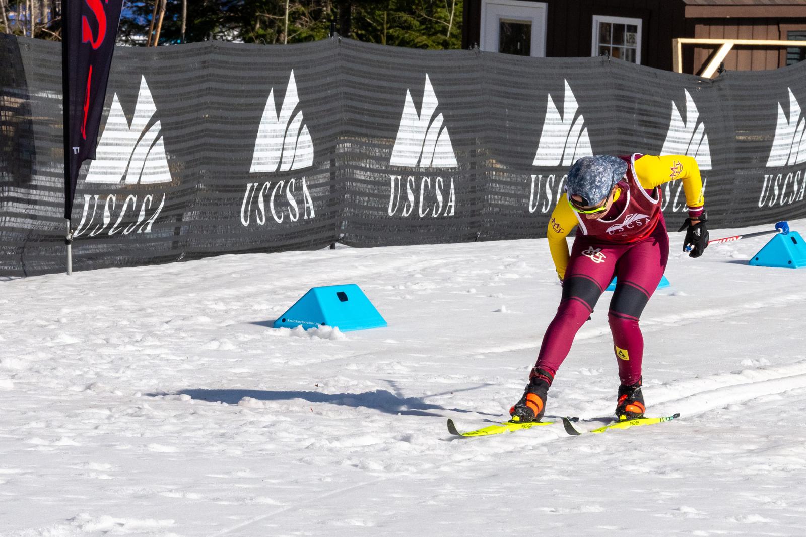 Greta Bochenek driving forward through soft, demanding snow at Mt. Van Hoevenberg during her gold medal performance in the 7.5K classic at USCSA Nationals.